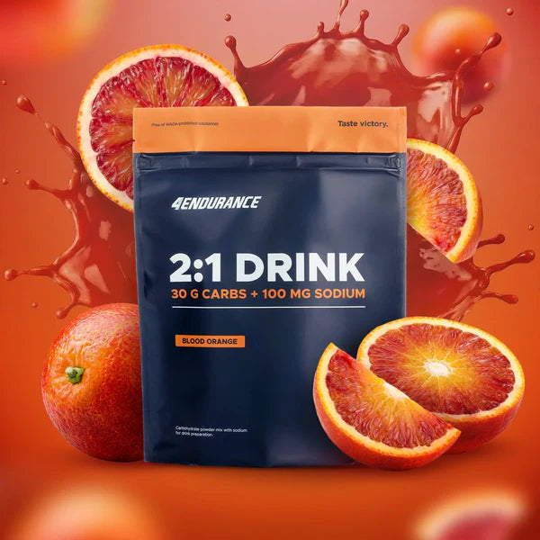 4Endurance 2:1 Drink package with blood orange slices and juice on an orange background
