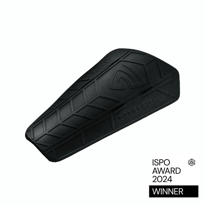 Black rubber block with a brand logo on a white background, featuring ISPO Award 2024 text.