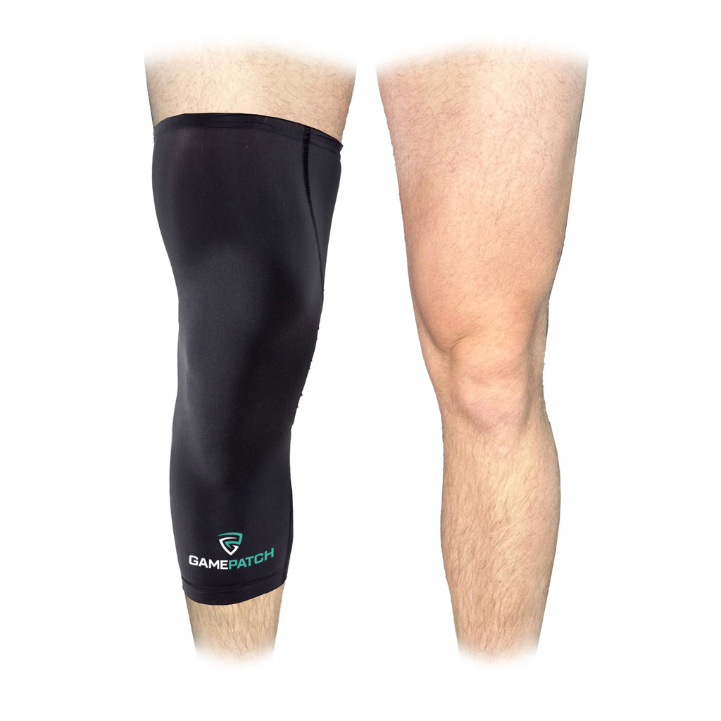 Black leg sleeve on a person's knee with 'GamePatch' branding on a white background