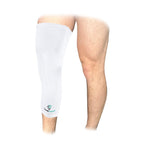White leg sleeve on a person's knee with a visible brand logo against a white background