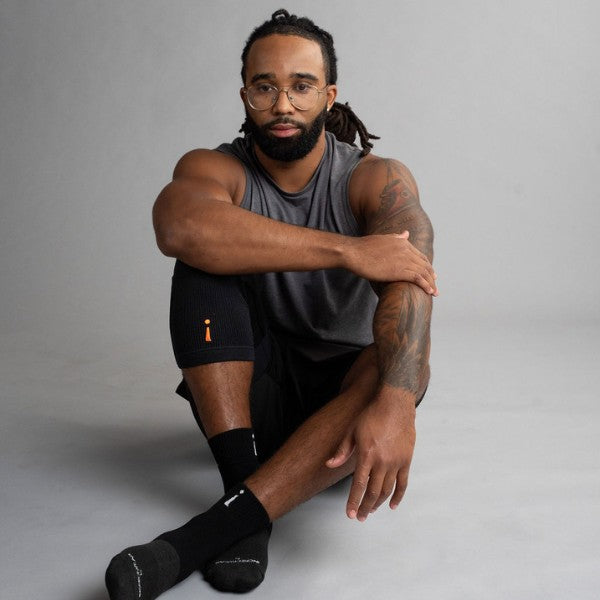 knee brace black seated on body incrediwear
