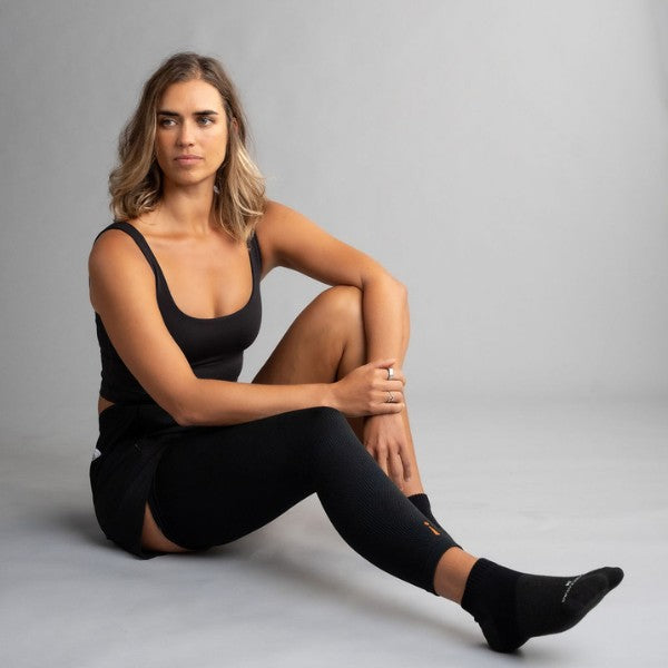 leg sleeve black seated female incrediwear