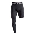 Black compression shorts with visible branding on a white background