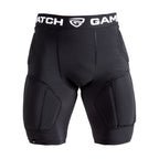 Black protective shorts with a brand logo on the waistband against a white background