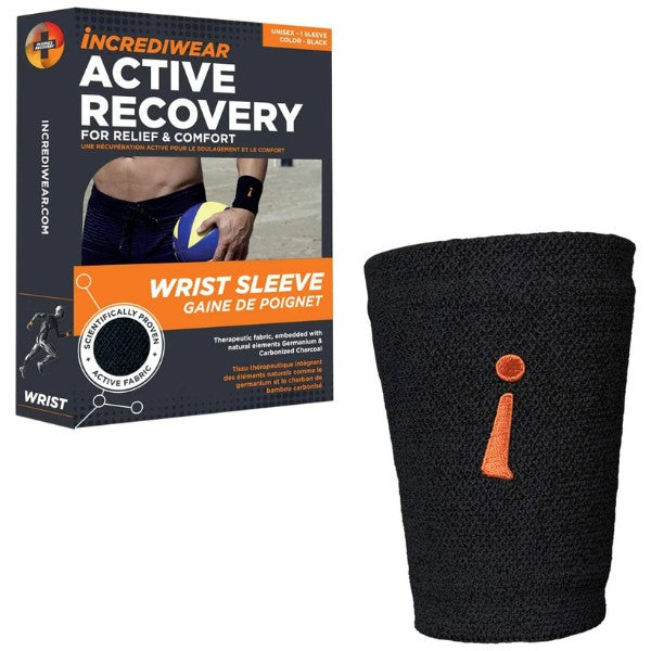 Black wrist sleeve with orange logo next to its packaging on a white background